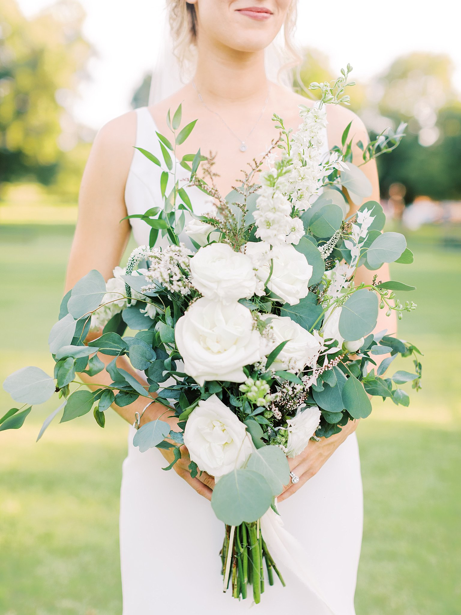 White bride bouquet at the orchard wedding in Texas